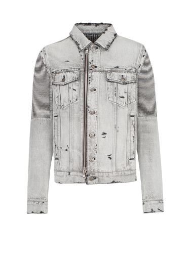 Faded and ripped jean jacket with ridged panels